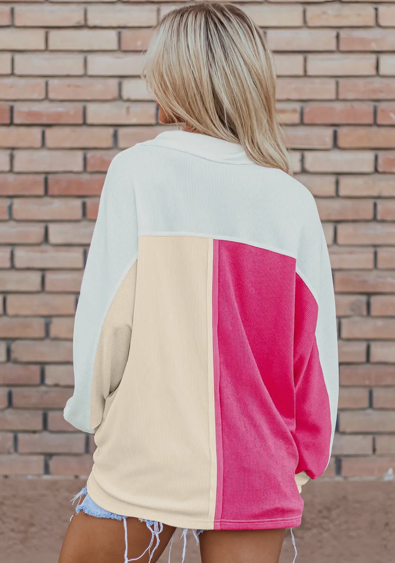 A multicolor pink oversized top